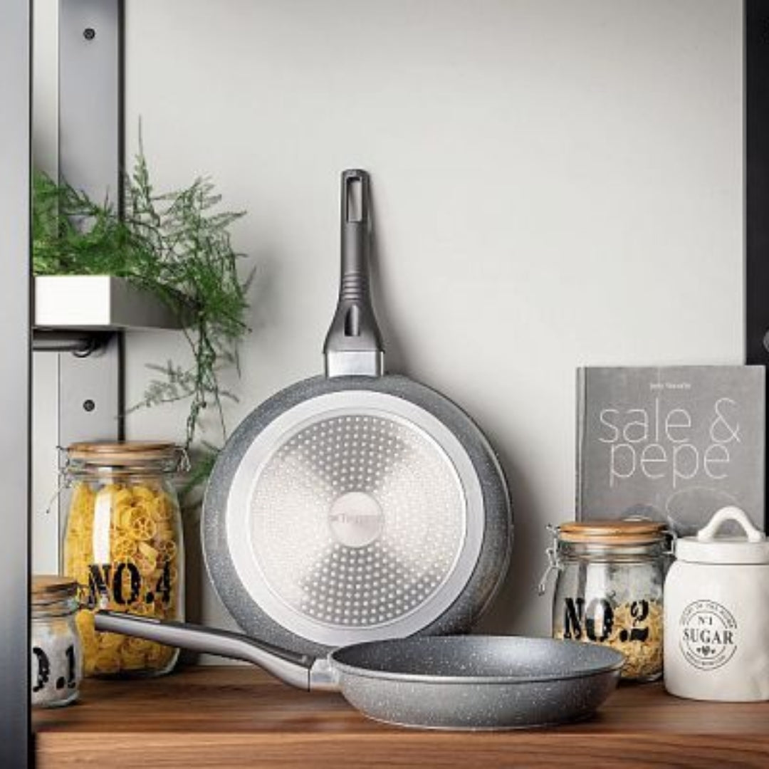 Tognana Italian Cookware UAE frying pan and saucepan displayed with kitchen accessories.