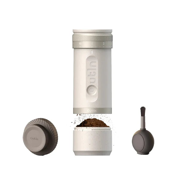 Outin Fino portable electric coffee grinder in white finish.